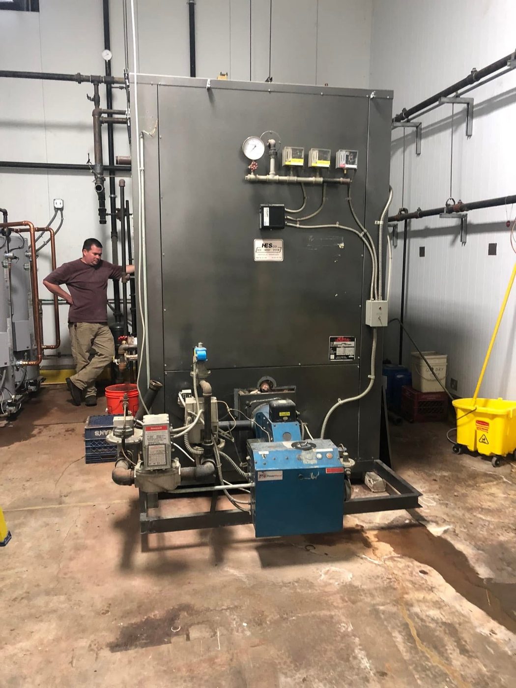 Sightler Services technician servicing a commercial boiler